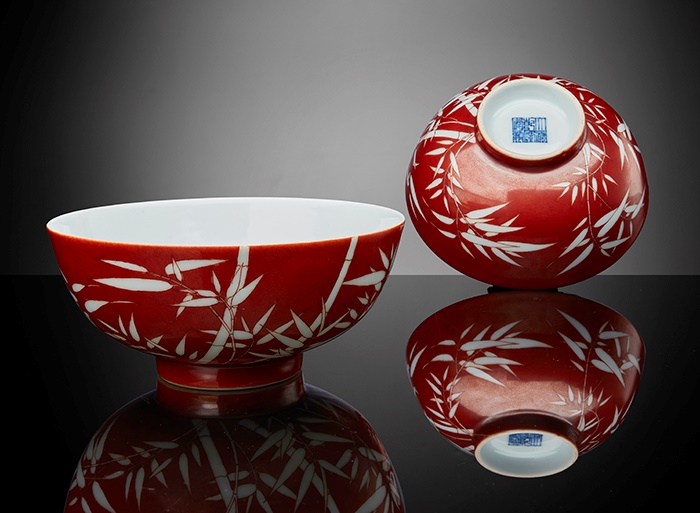 PAIR OF CORAL-GROUND RESERVE-DECORATED 'BAMBOO' BOWLS QIANLONG MARK AND PERIOD